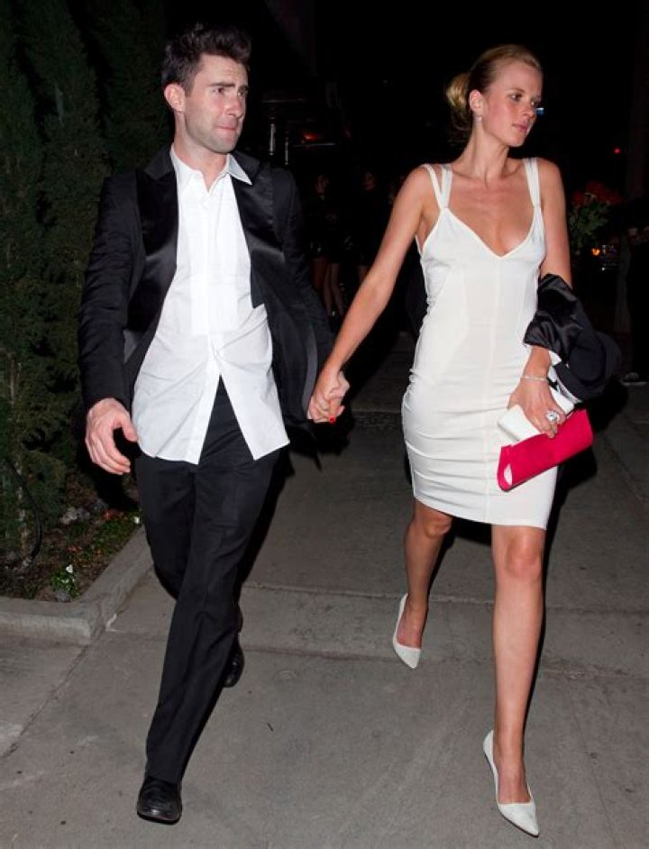 Adam Levine, right, and Behati Prinsloo arrive at the Oscars, at the Dolby Theatre in Los Angeles 87th Academy Awards - Arrivals, Los Angeles, USA - 22 Feb 2015