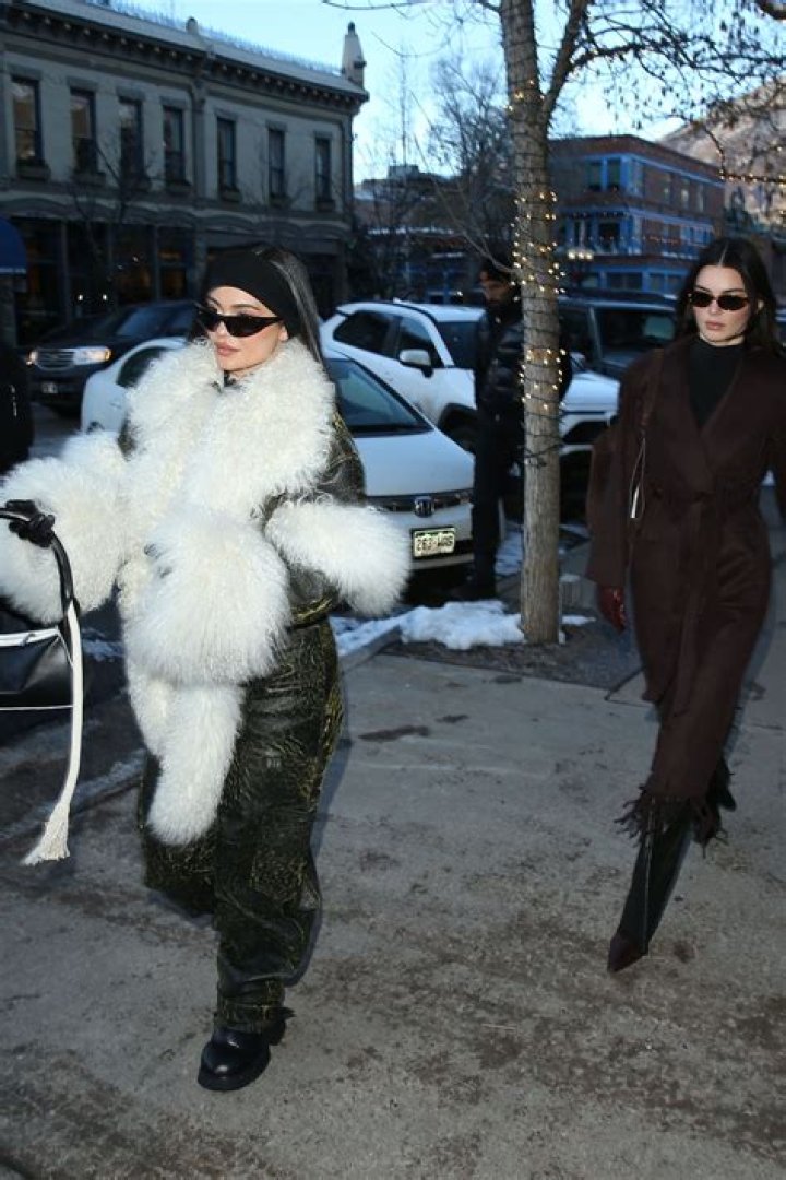 Aspen, CO - *EXCLUSIVE* -Kylie and Kendall Jenner enjoy a night out at 'Matsuhisa' Sushi Restaurant in Aspen Colorado.The sisters put on a very stylish display as they stepped out together for dinner on Sunday for a girl&rsquo;s night out. Kylie stepped out in jeans, a white collared top with buttons and a fur bucket hat. Kendall put on a chic display in all black and a leather coat with fur lining. Pictured: Kendall Jenner BACKGRID USA 12 DECEMBER 2022 BYLINE MUST READ: 1 / BACKGRID USA: +1 310 798 9111 / UK: +44 208 344 2007 / *UK Clients - Pictures Containing Children Please Pixelate Face Prior To Publication*