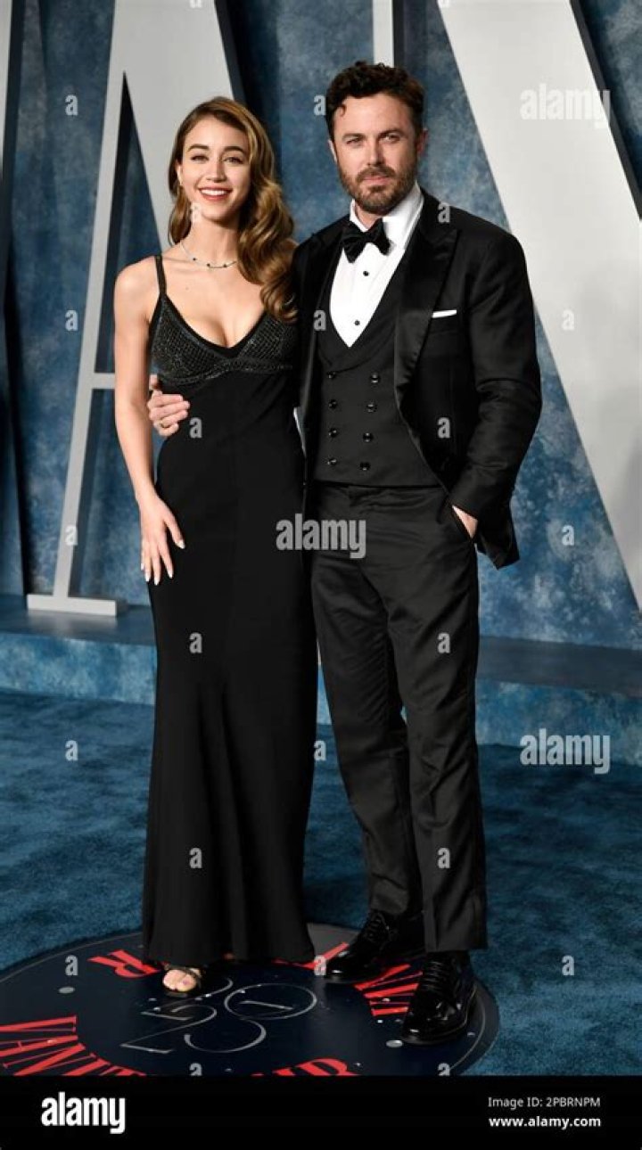 Caylee Cowan, left, and Casey Affleck pose for photographers upon arrival at the amfAR Cinema Against AIDS benefit at the Hotel du Cap-Eden-Roc, during the 75th Cannes international film festival, Cap d'Antibes, southern France 2022 amfAR Arrivals, Cannes, France - 26 May 2022