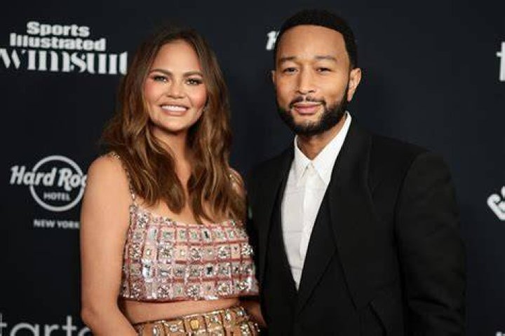Chrissy Teigen, left, and John Legend arrive for the State Dinner with President Joe Biden and French President Emmanuel Macron at the White House in Washington France, Washington, United States - 01 Dec 2022