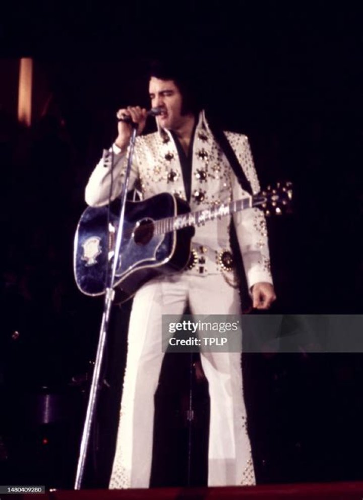 Elvis Presley performs on stage in an unspecified location. A three-CD box set slated for release the first week of August 2013 chronicles two recording sessions by Elvis Presley at the renowned Stax Records in Memphis in 1973 Elvis Presley at Stax, USA