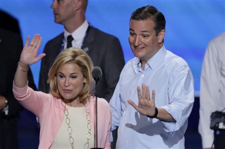 Heidi and Ted Cruz wave to constituents