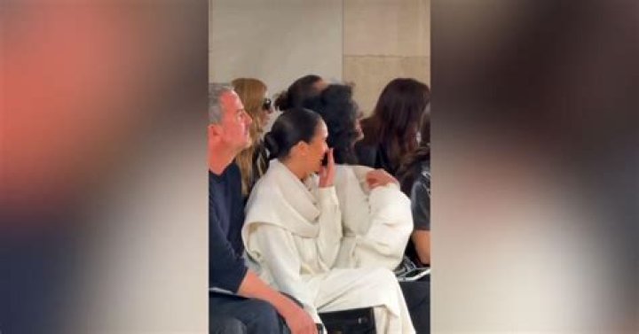 Meghan Markle laughs while holding son Archie